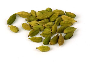 Learn About Cardamom's Health Benefits a pile of green fruits