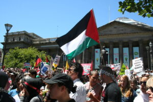 a group of people holding flags